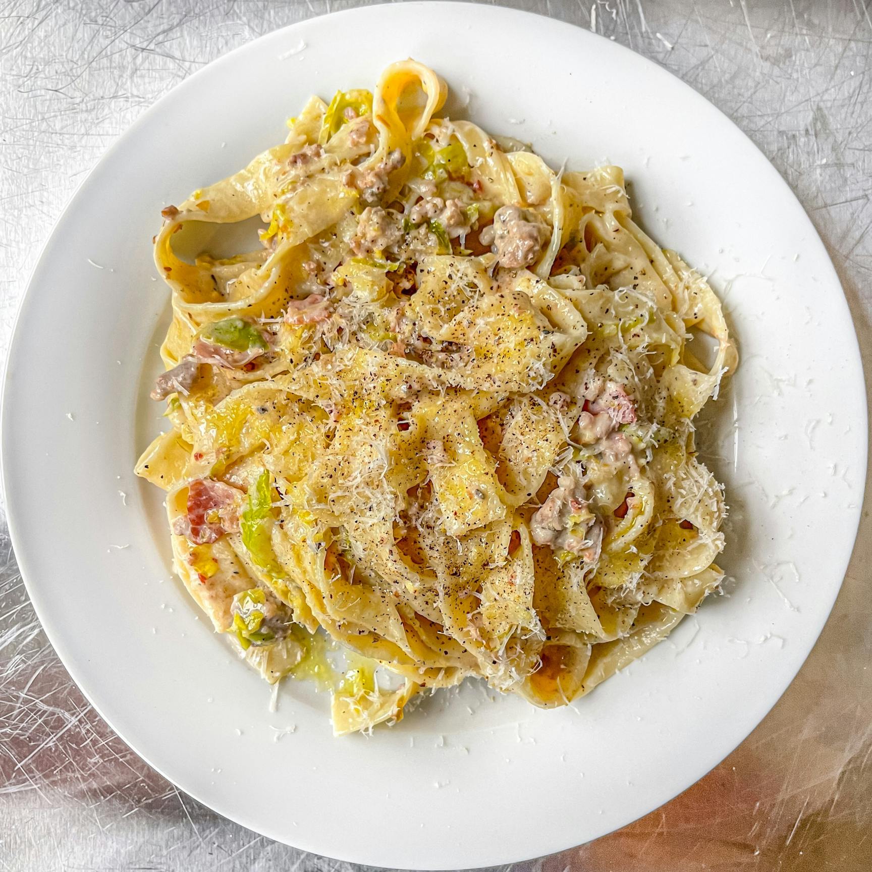 Creamy Sausage Bacon and Brussels Sprout Tagliatelle